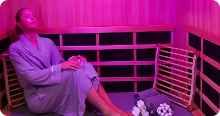 A guest relaxing in an infrared sauna